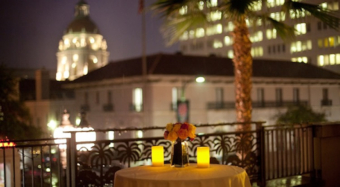 view of pasadena city hall from the sofia banquet hall balcony at night